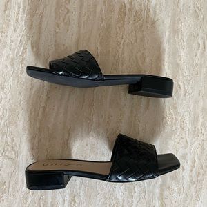 Black leather woven sandals